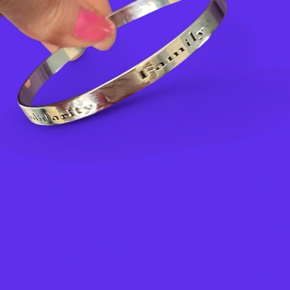 Silver tone family, solidarity, truth etc bracelet